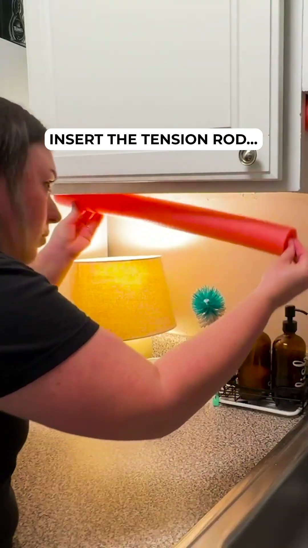 Stick a pool noodle under your kitchen cabinet - this is brilliant!
