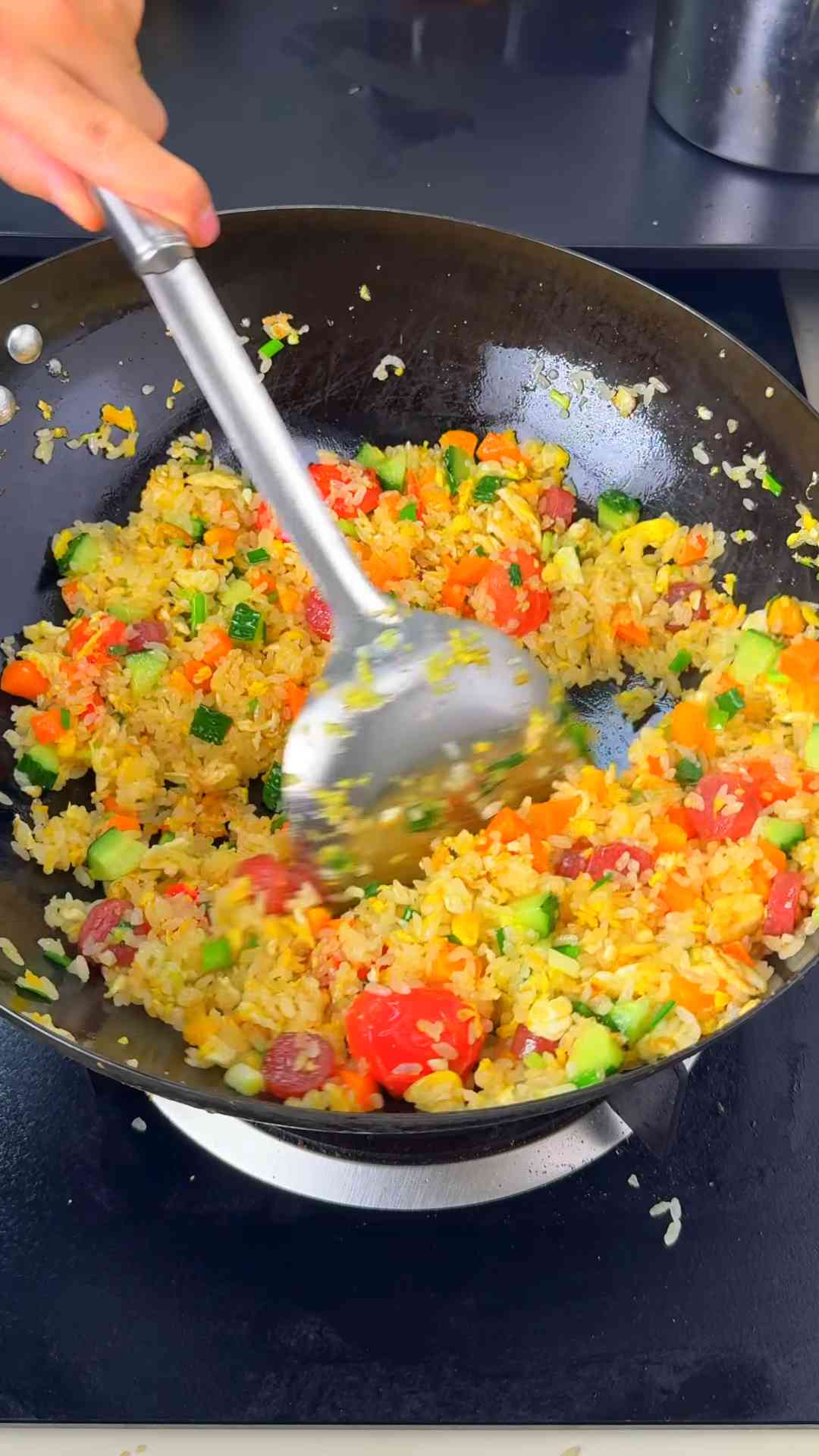 Chinese sausage egg fried rice with cherry tomatoes