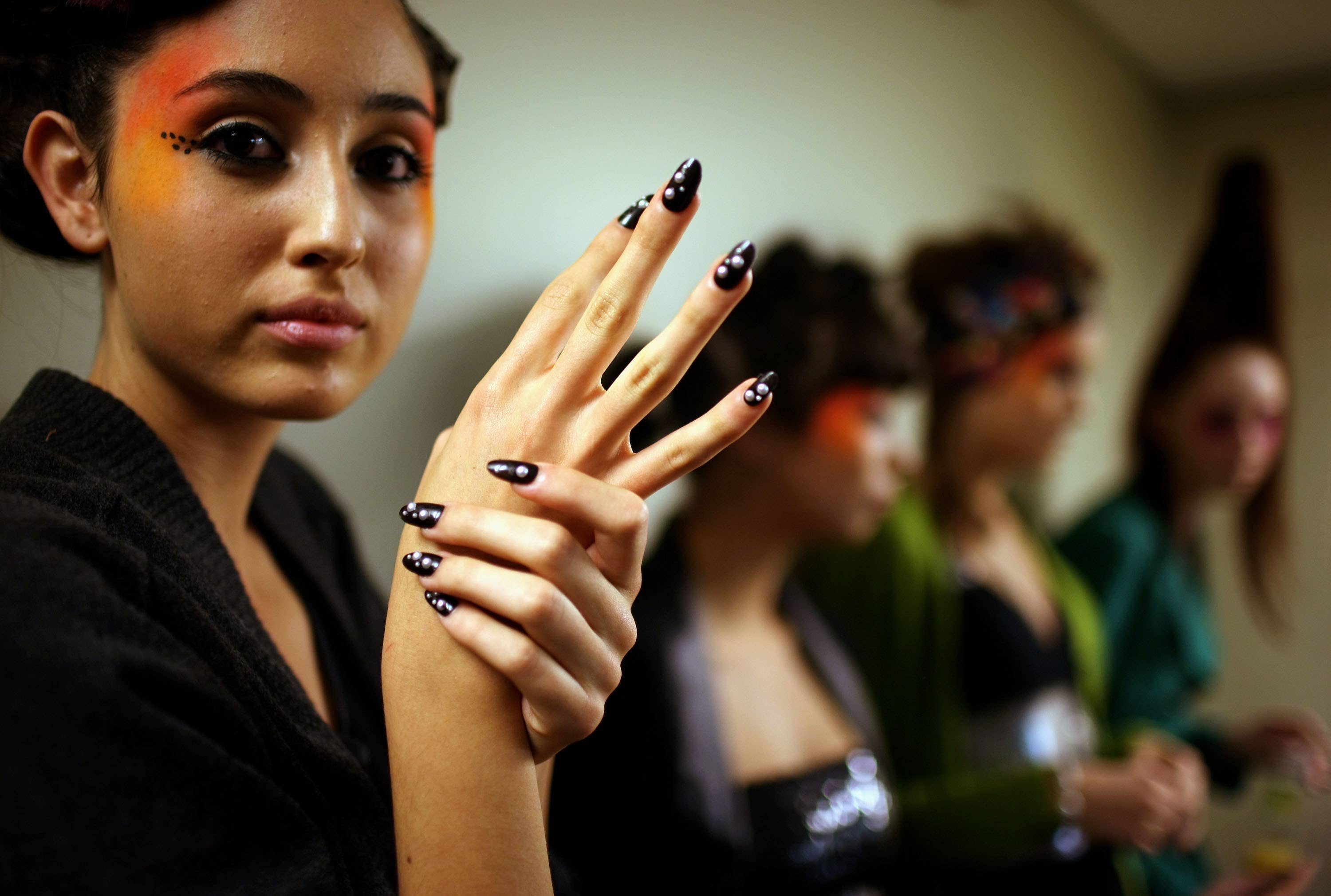 Discover why polka dot cat-eye nails are trending 1,585% this fall