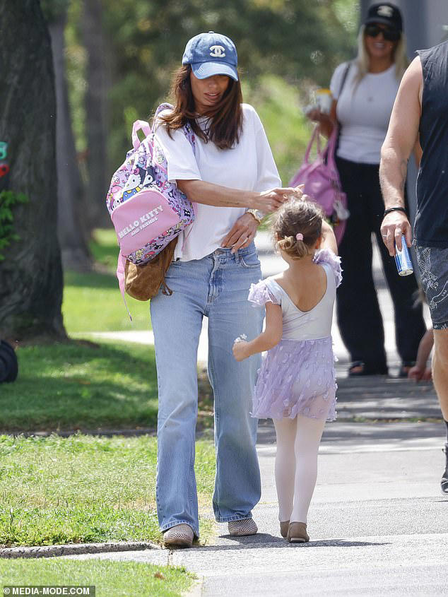 Snezana Wood is supported by a pal as she steps out without her wedding ...
