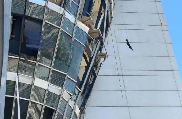 A year after being hit by Iranian missile, iconic tower returns to full ...
