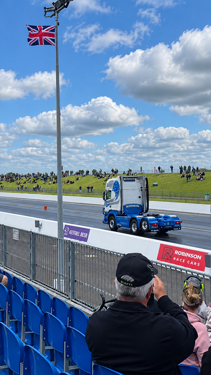 Massive semi truck drag race competition