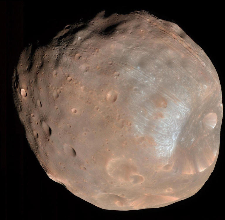 Japan launches spacecraft to mysterious moons of Mars in a bold mission ...