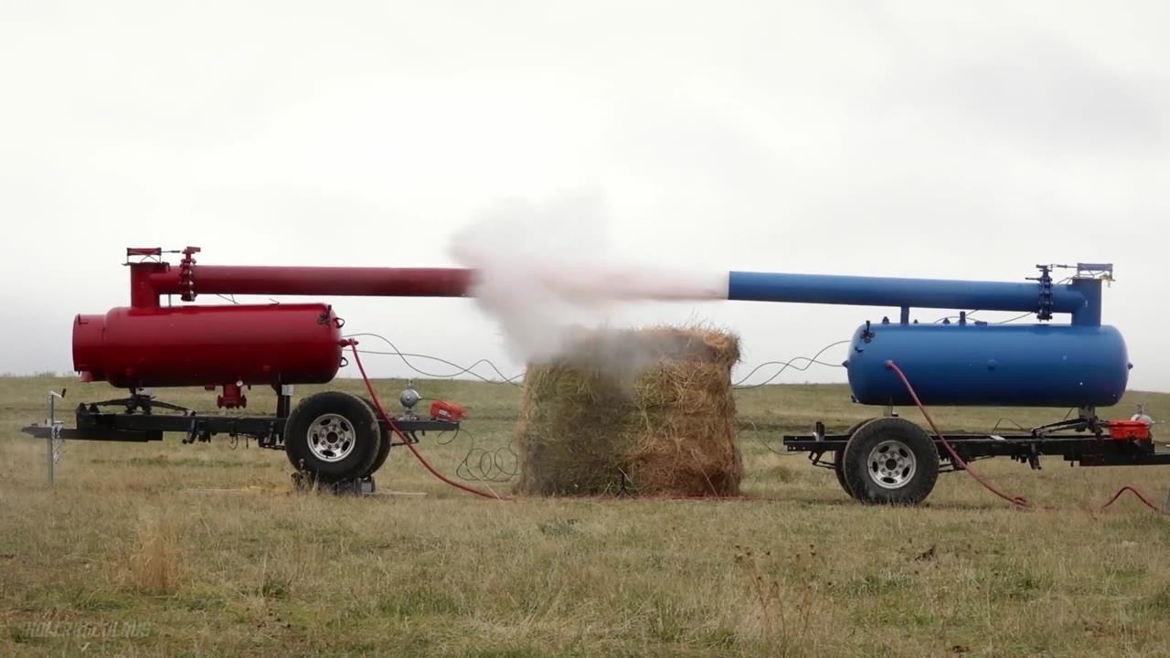 Two air cannons fire objects at each other in a high-speed collision test