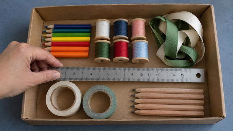 Turn a shallow cardboard box into a grab and go craft station