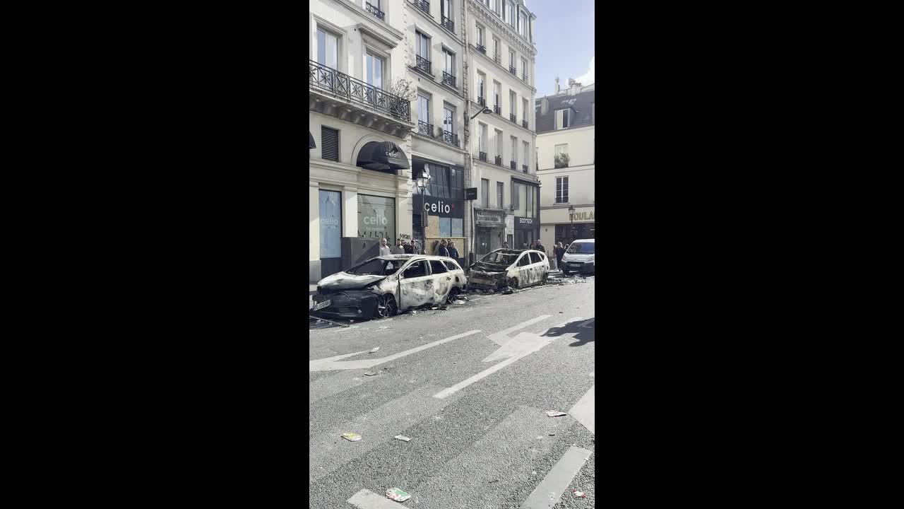 Scenes of destruction in Paris as riot-hit streets reveal burned cars ...
