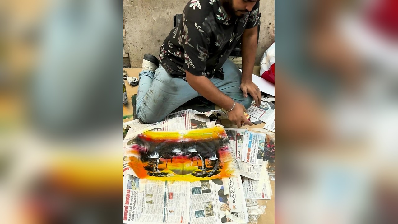 A random street artist spray paints my family jacket