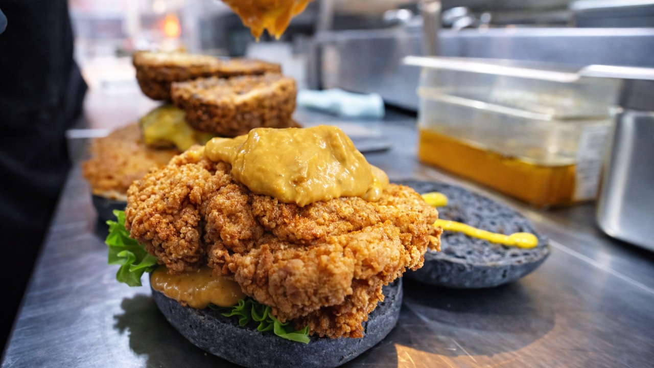 Inside the factory making Malaysia's famous salted egg chicken burger
