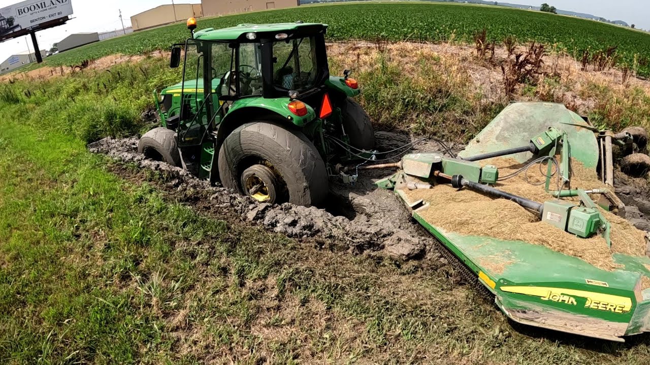 Recovering a large tractor stuck in a deep ditch