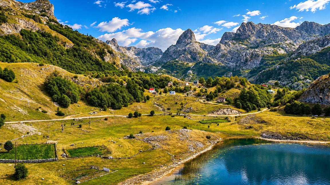 Hidden alpine village surrounded by towering rocky mountains
