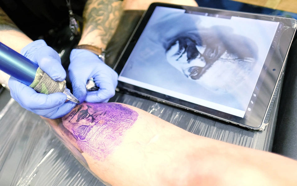 UV-activated ink and 2027 tattoo trends signal cultural shift