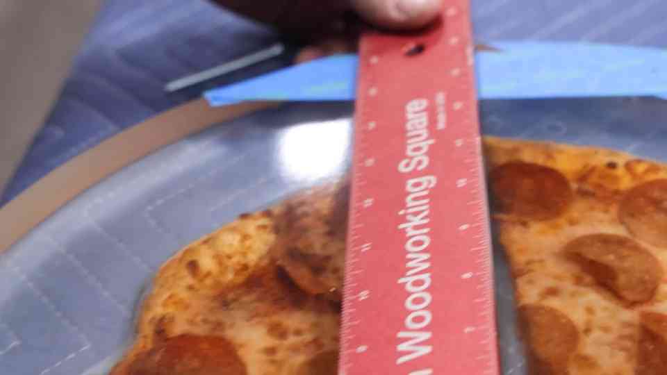 He encased a real Domino's pizza in epoxy resin to prank his father-in-law