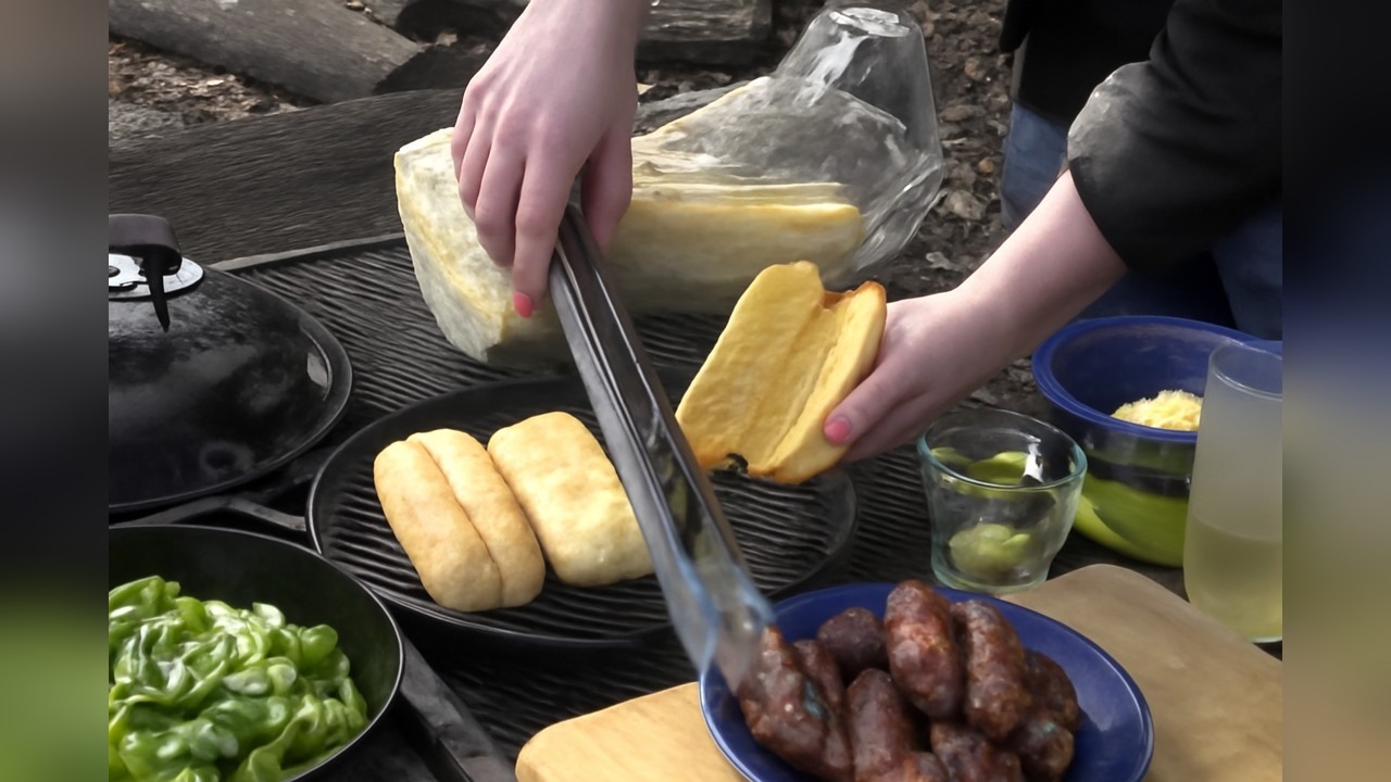 Italian sausages stuffed with breakfast sausages hit the grill