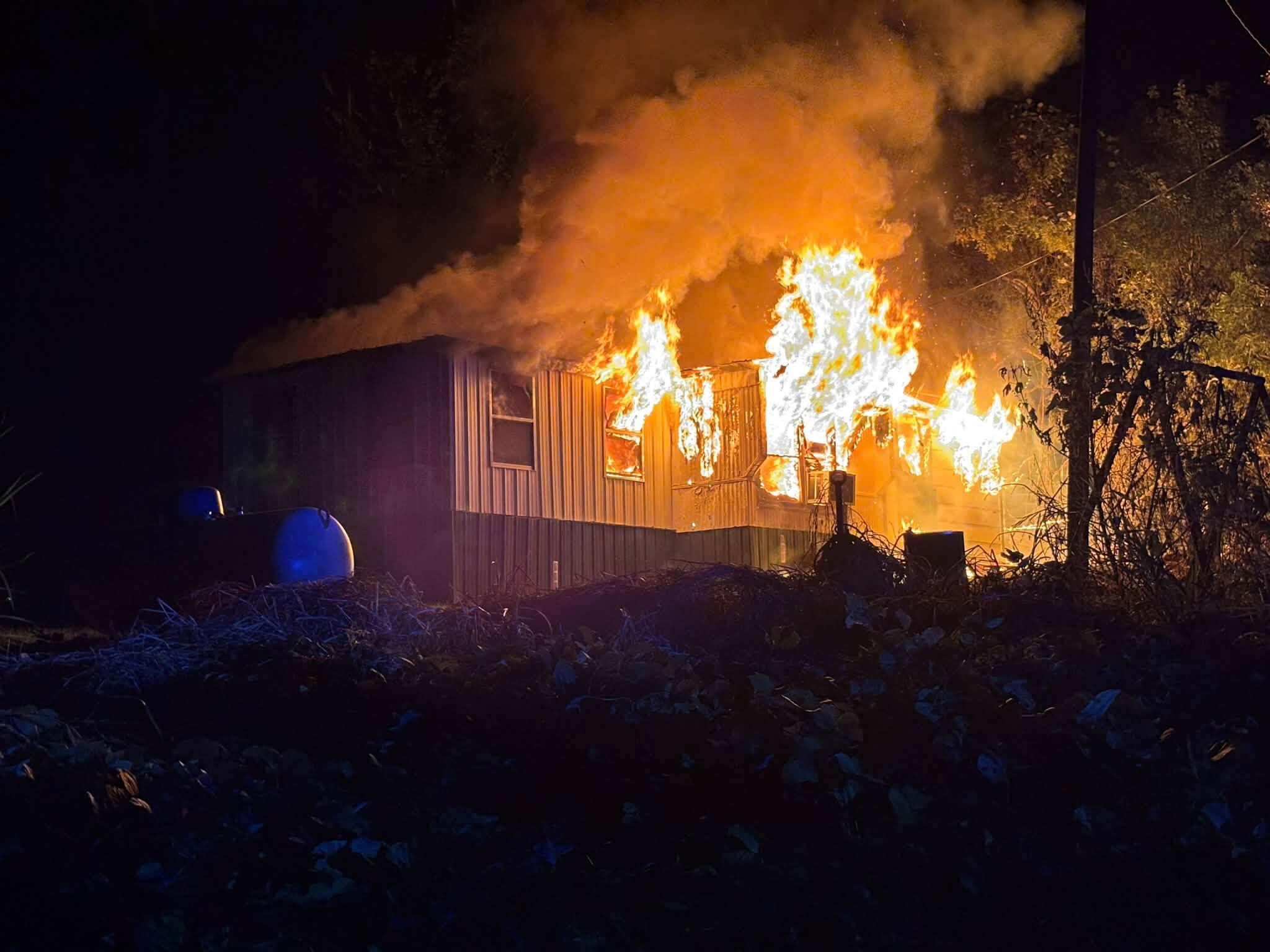 Mobile home heavily damaged in overnight Adams County fire