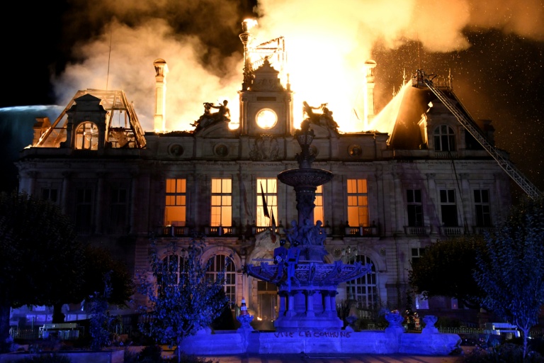 France arrests man, calls in anti-terror police over town hall protest fire