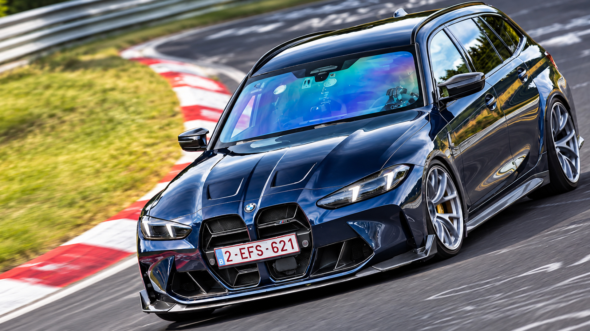 BMW M3 Touring tackles a fast Nürburgring corner
