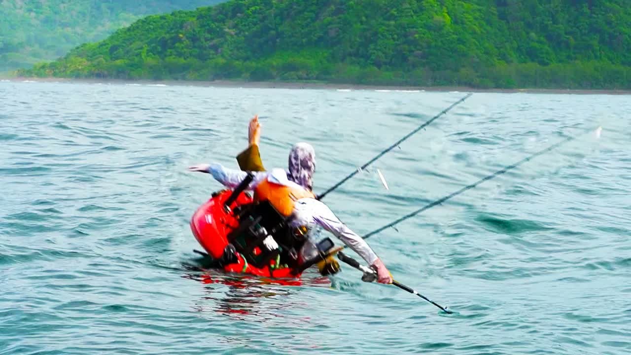 Jack lands a roosterfish on a bucktail during a Panama kayak trip