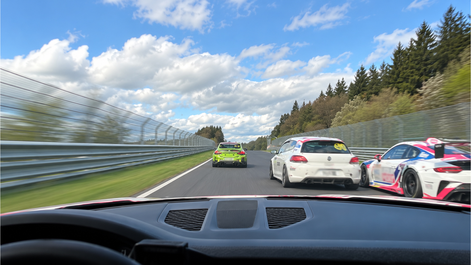 Porsche threads through a tight Nürburgring traffic pack