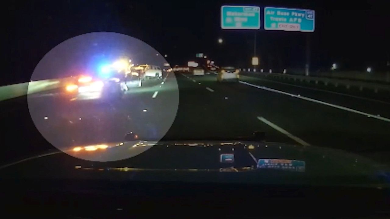 Tesla slams into police car at closed crash scene, driver blames Full ...