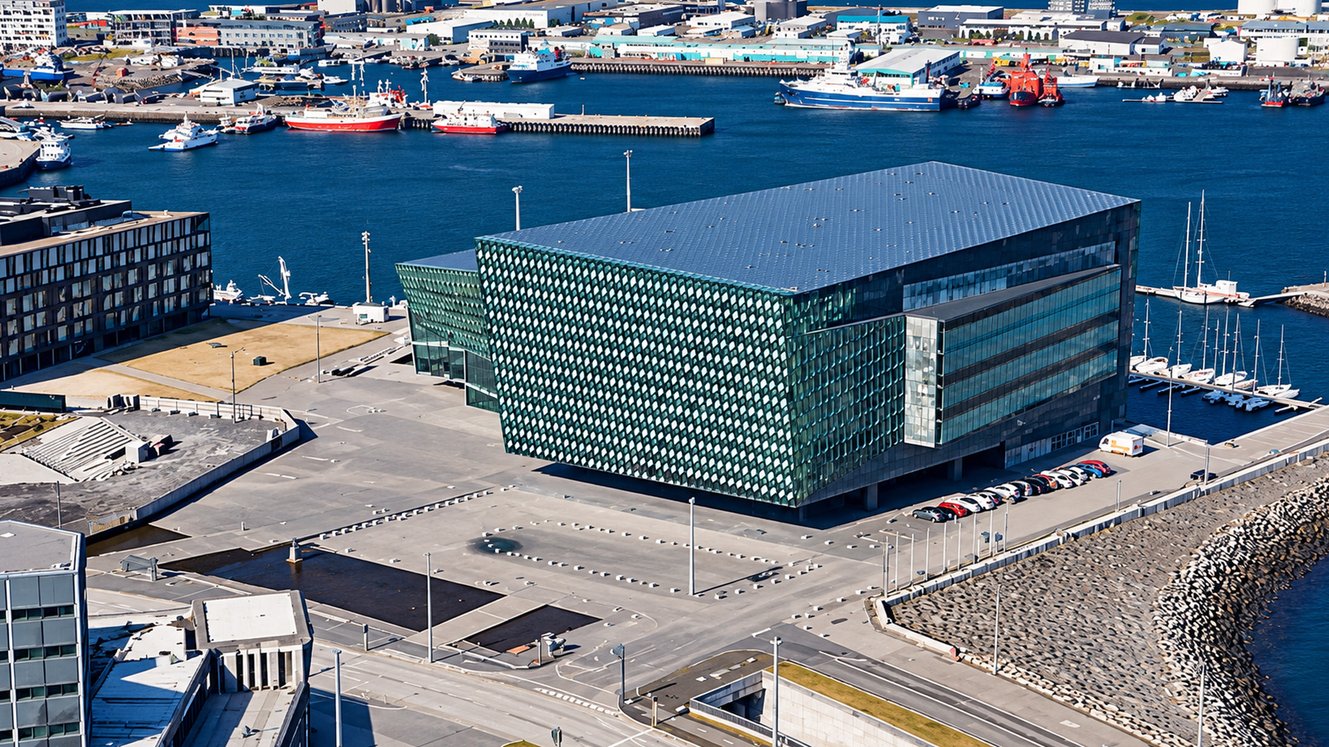 Harpa Concert Hall stands between Reykjavik’s city center and busy harbor