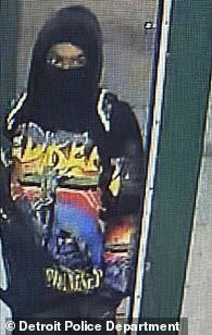 Suspect two was wearing a black hooded sweatshirt with a colorful print