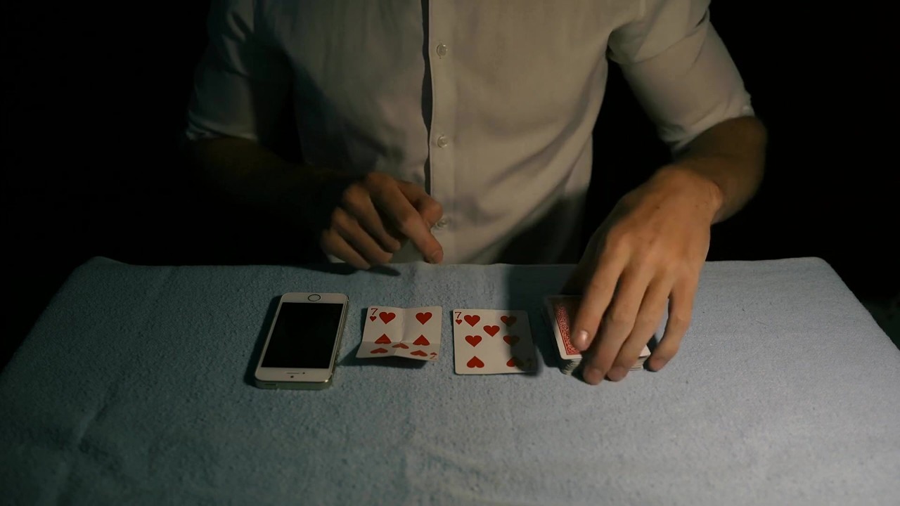 Oscar Owen teaches a playing card phone trick without apps