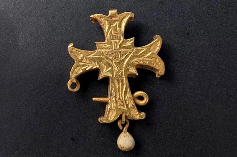 Gran discovers medieval gold cross worth upwards of £20k while metal ...