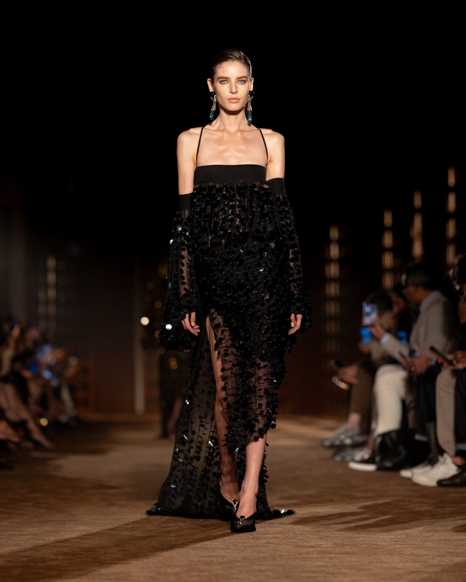 Dua Lipa’s opera gloves shimmer with cascades of sequins
