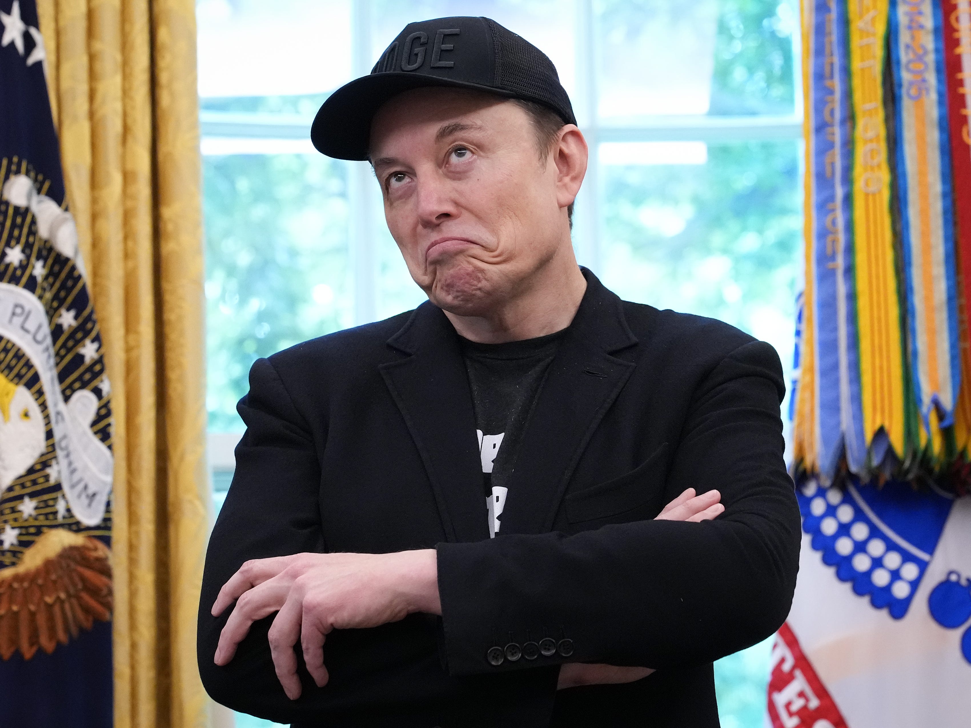 Elon Musk says 'AI and robots' are the only way to solve America's debt ...
