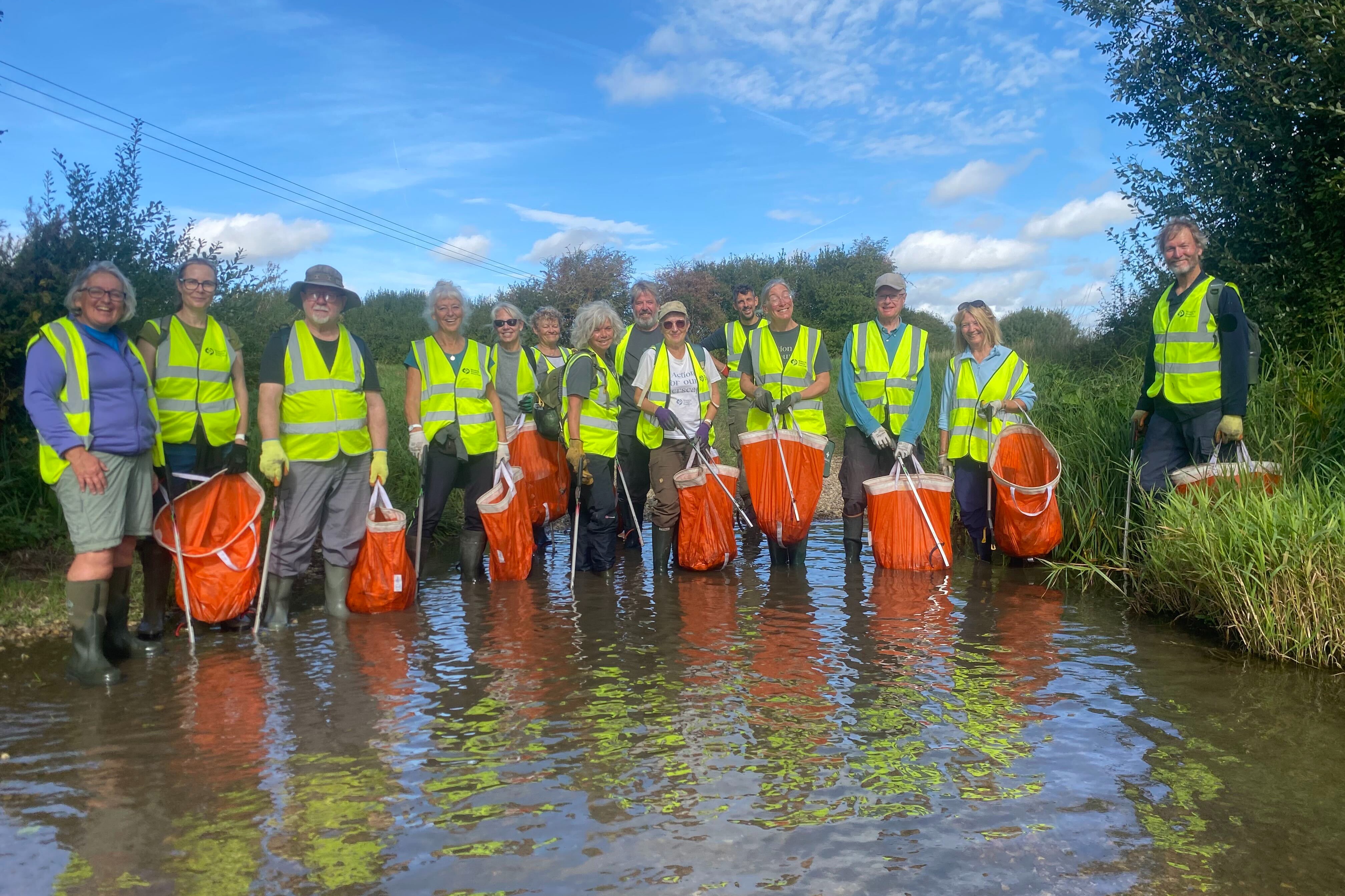 Volunteers help clean up River Lavant's chalk stream