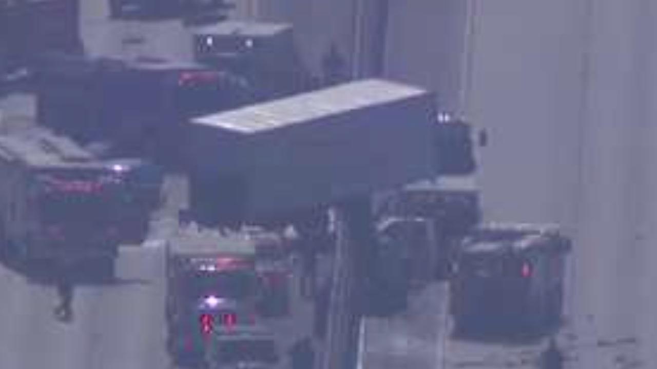 Big rig dangles on 5 Freeway after crash near Old Town