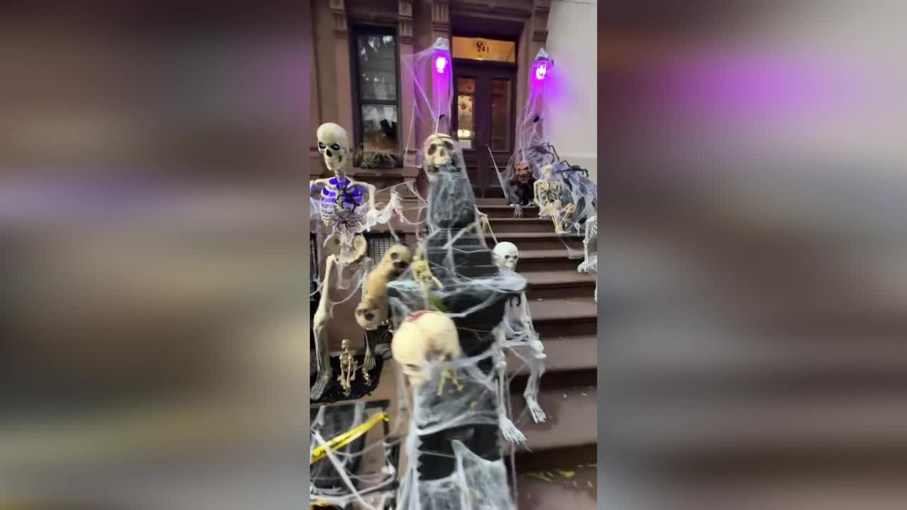 Spooky skeleton takeover transforms iconic Upper West Side brownstone stoop