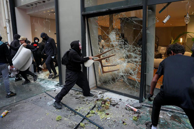 France sends in troops as Paris simmers in aftermath of riots
