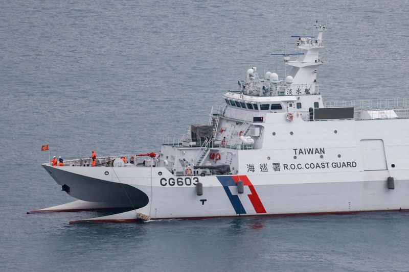 China sends naval forces to monitor US warship near disputed shoal