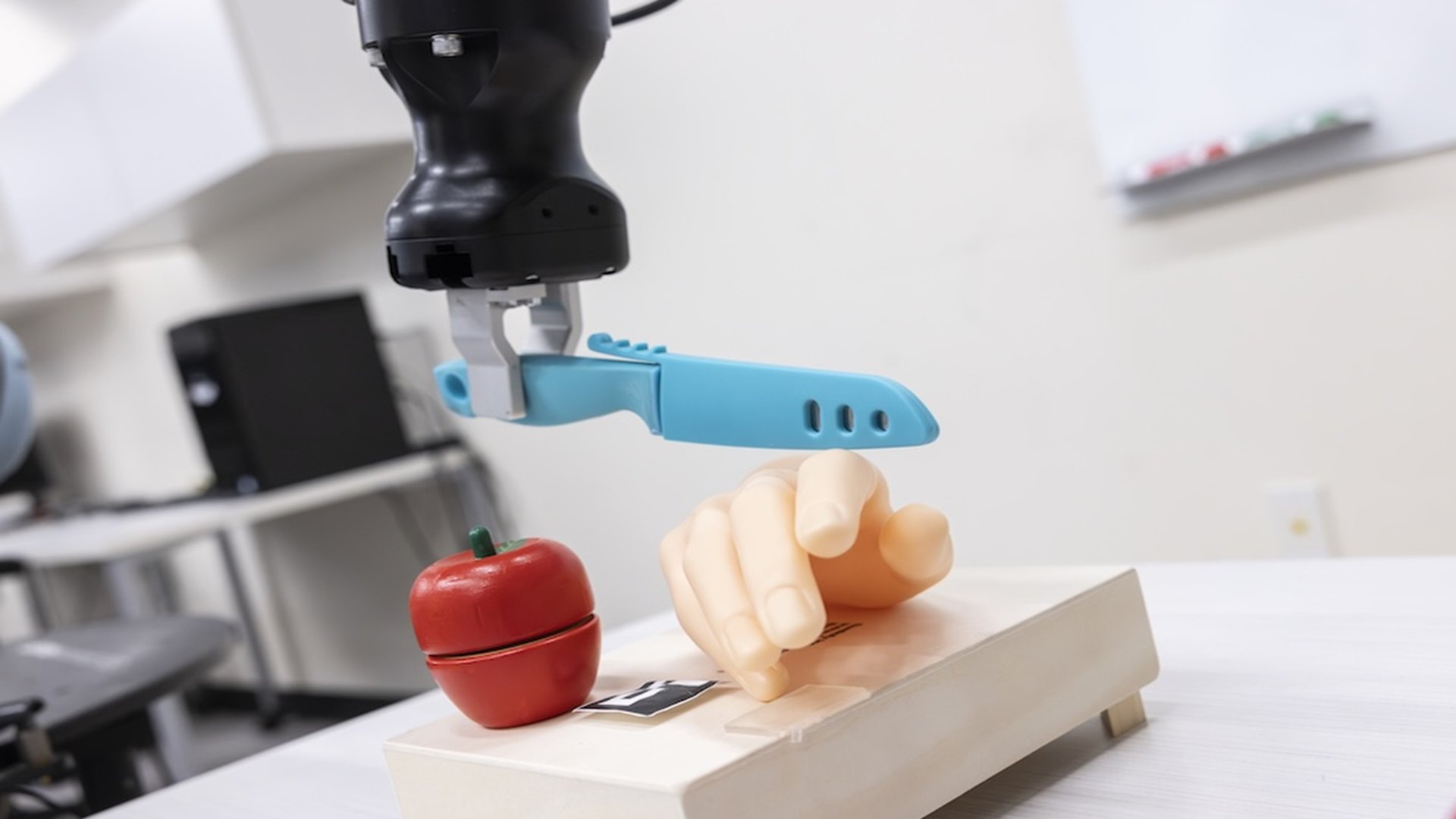 Two-letter trigger makes US robot turn knife toward human hand in ...