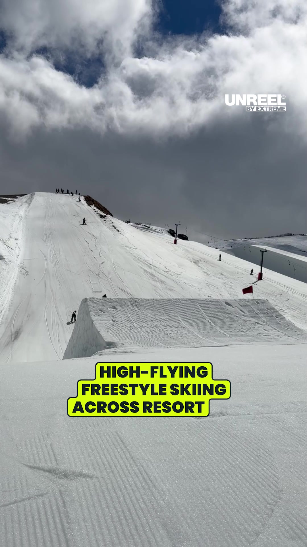 Freestyle skiing aerial acrobatics: Inverted mute grab off a big air ...