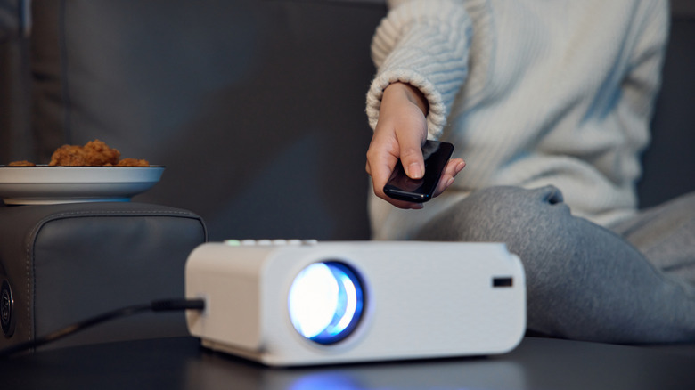 How far away from the wall should you set up your home projector? It ...
