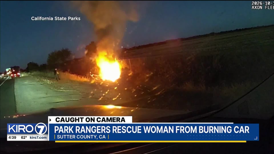 Two California park rangers rescue woman from burning car