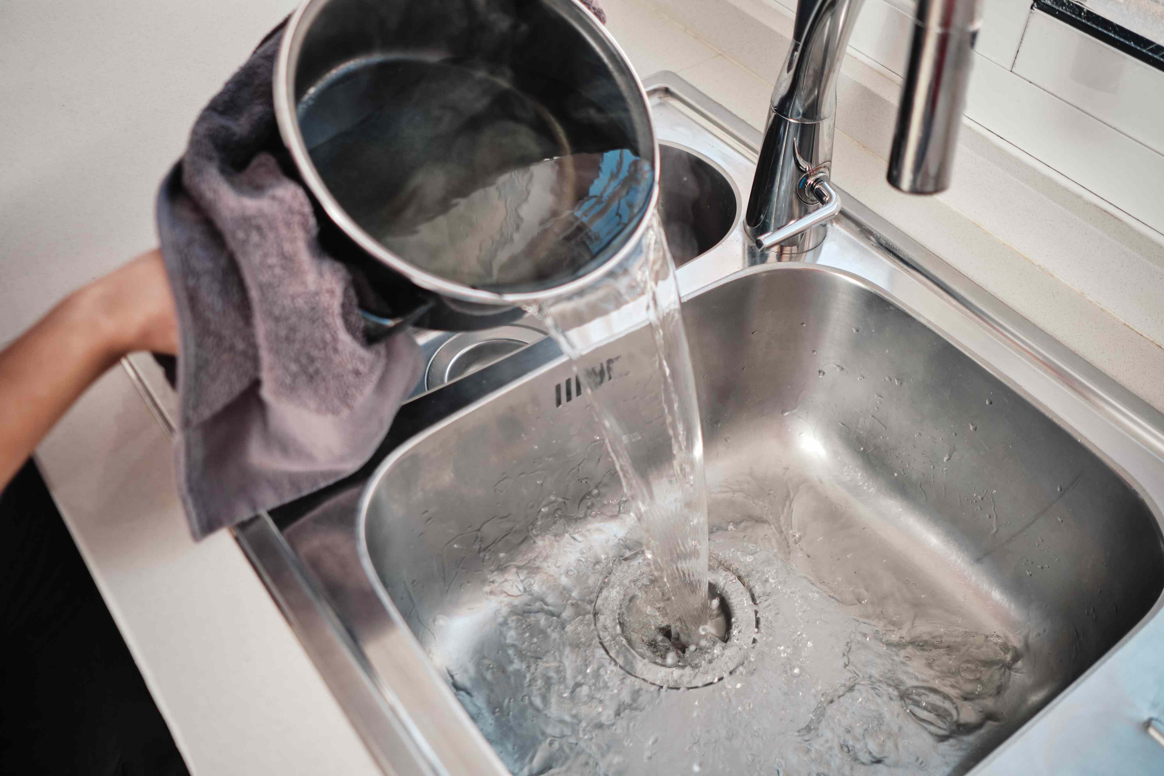 Is it safe to pour boiling water down the sink? Here’s what a plumber ...