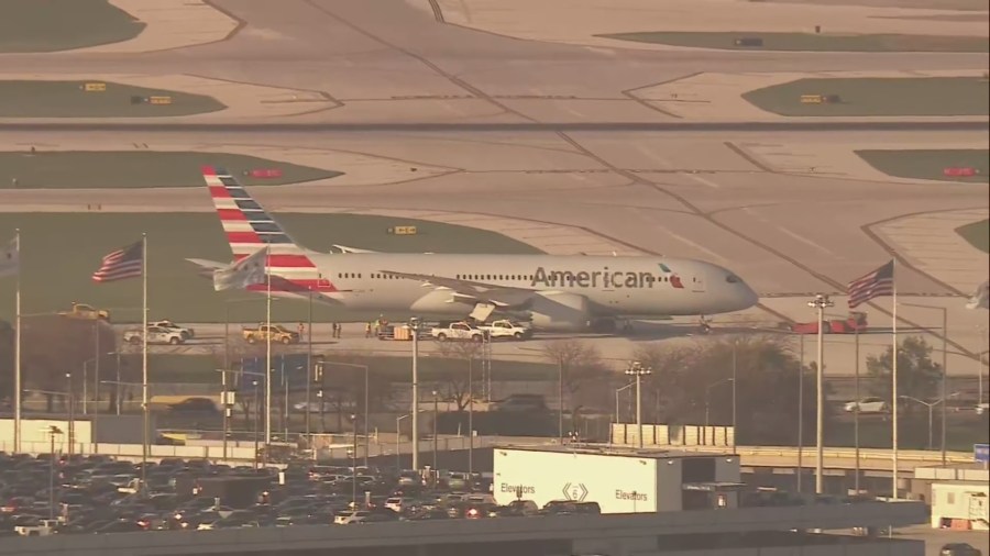 1 hospitalized after American Airlines flight blows tire after landing at O'Hare