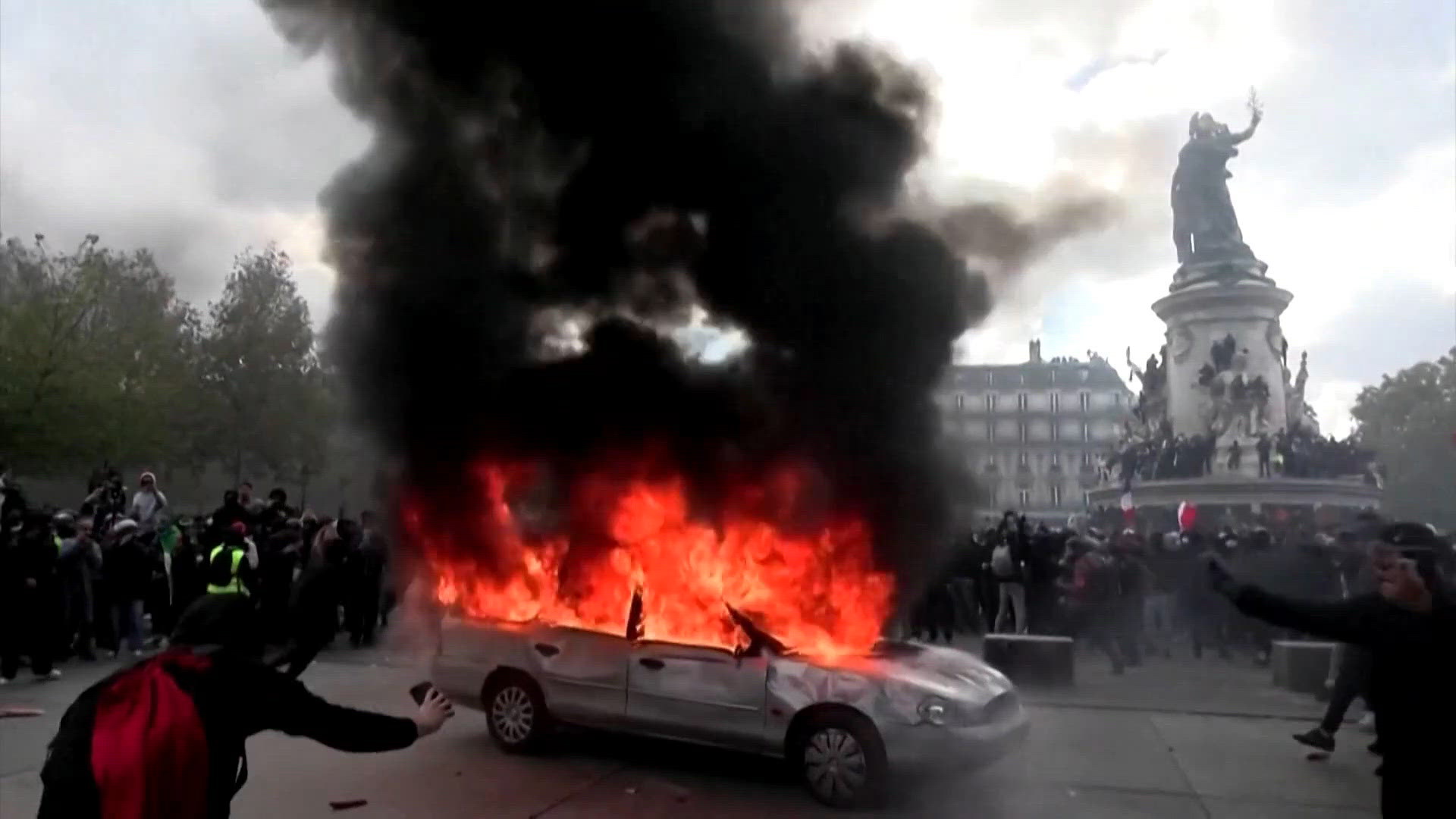 France imposes curfews after riots as Trump faults Macron policies