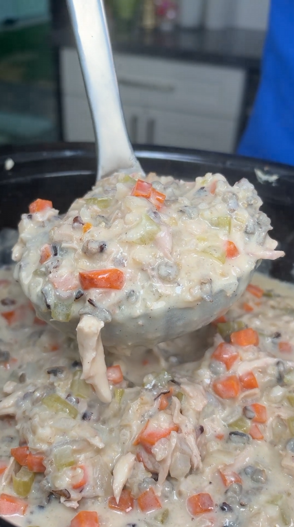 This creamy crockpot chicken and wild rice soup tastes just like Panera