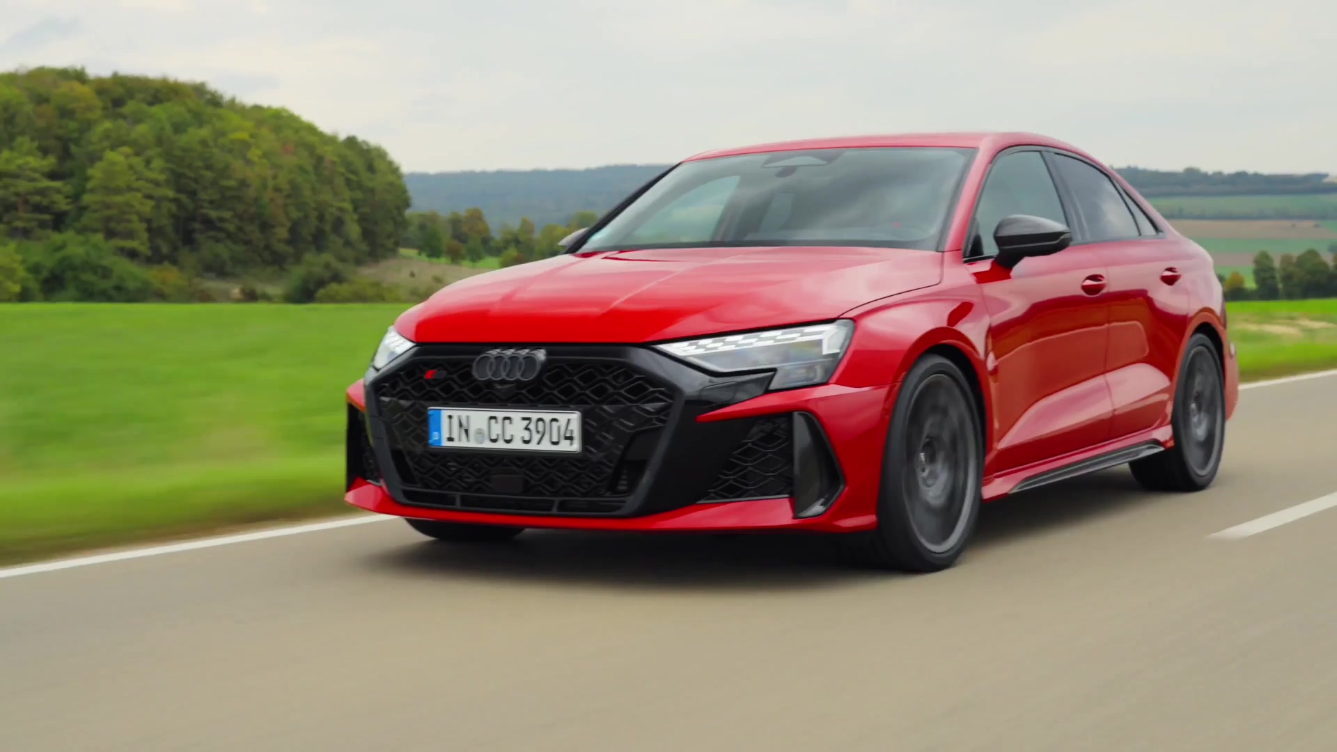 Audi RS 3 sedan in red driving video