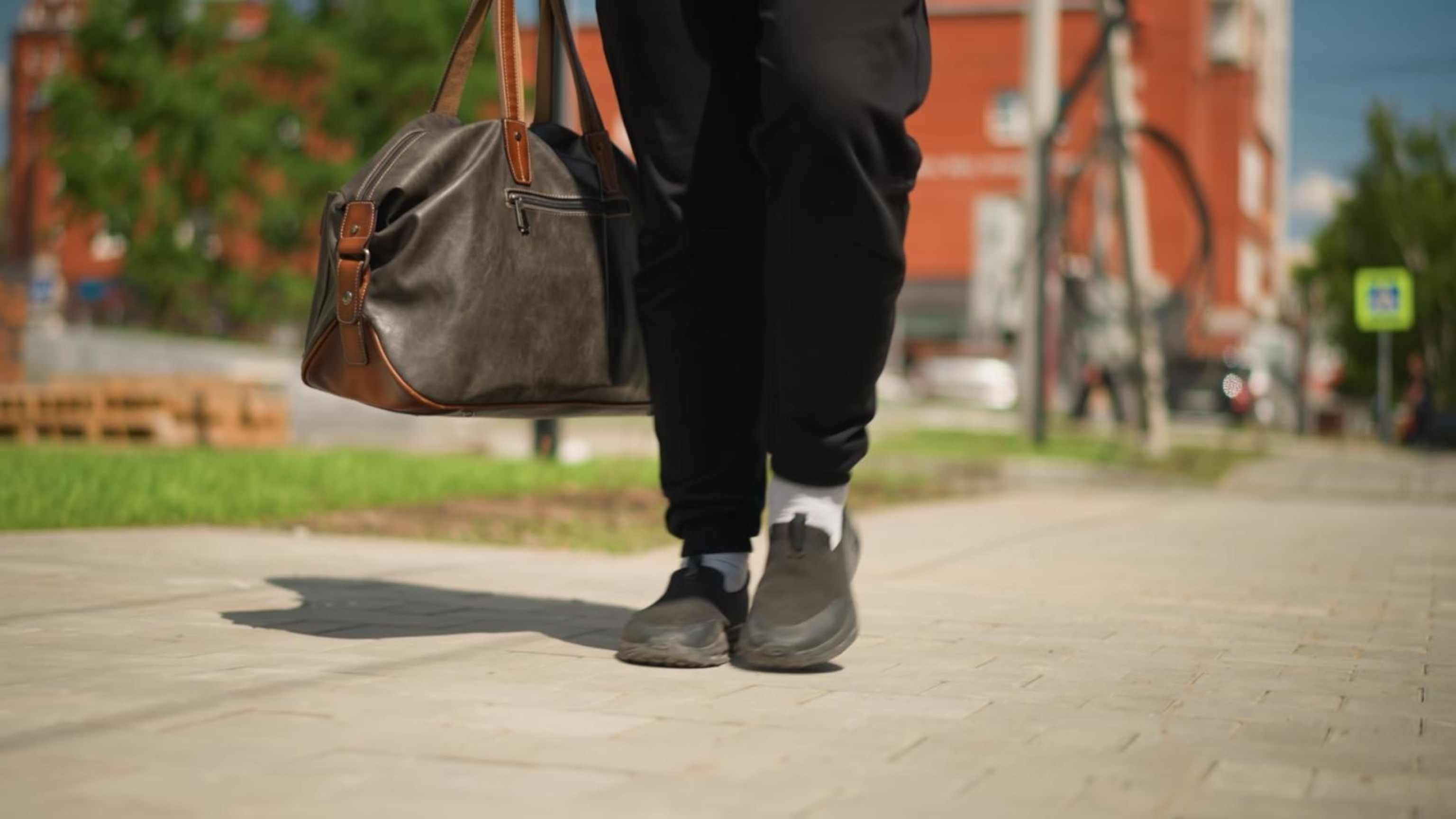 The man purse is dead. Long live the man bag.