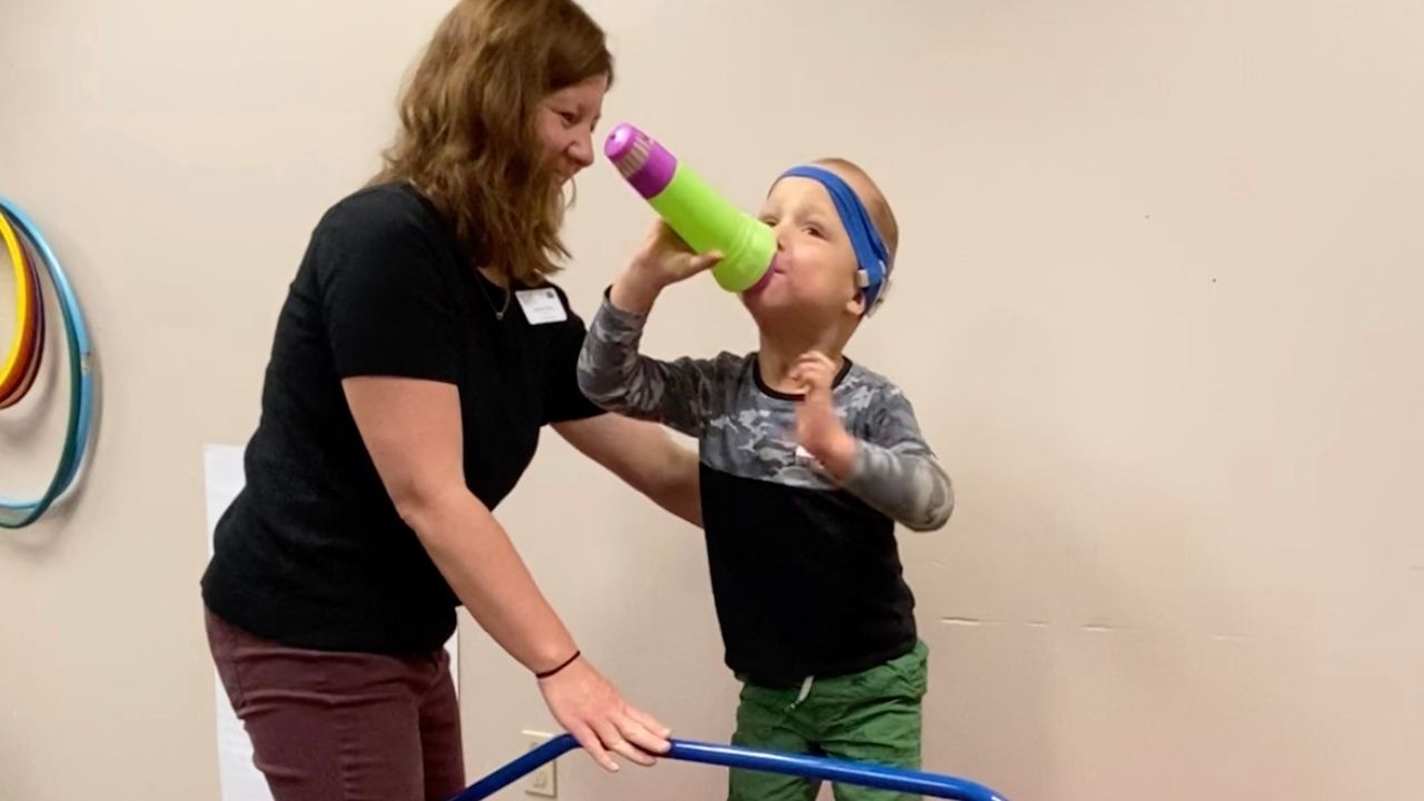 Boy with cerebral palsy stands for first time to sing Lion King | Happily