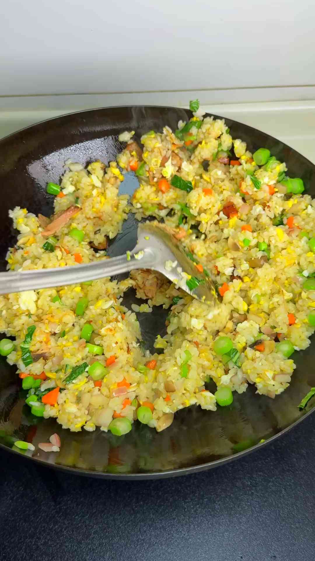Egg fried rice served with juicy braised pork