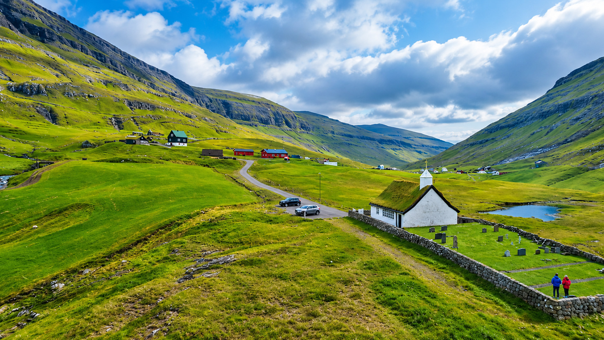 A white church creates a striking contrast in the Faroe Islands