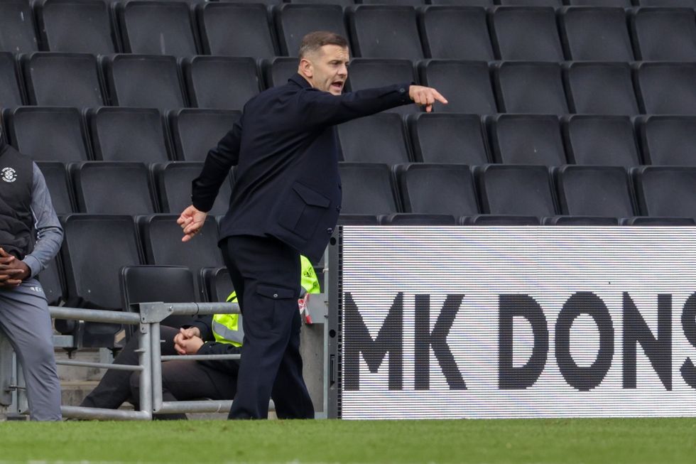 Jack Wilshere shoves Barnsley boss as handshake clash sparks melee ...