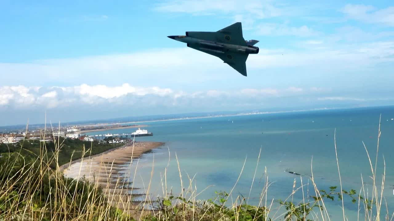Saab Draken jet roars past Beachy Head - the cliffs amplify its engine ...
