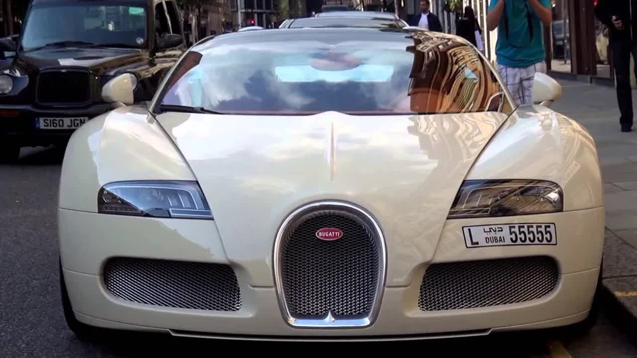 Several Bugatti Veyron editions and rare hypercars drive in London